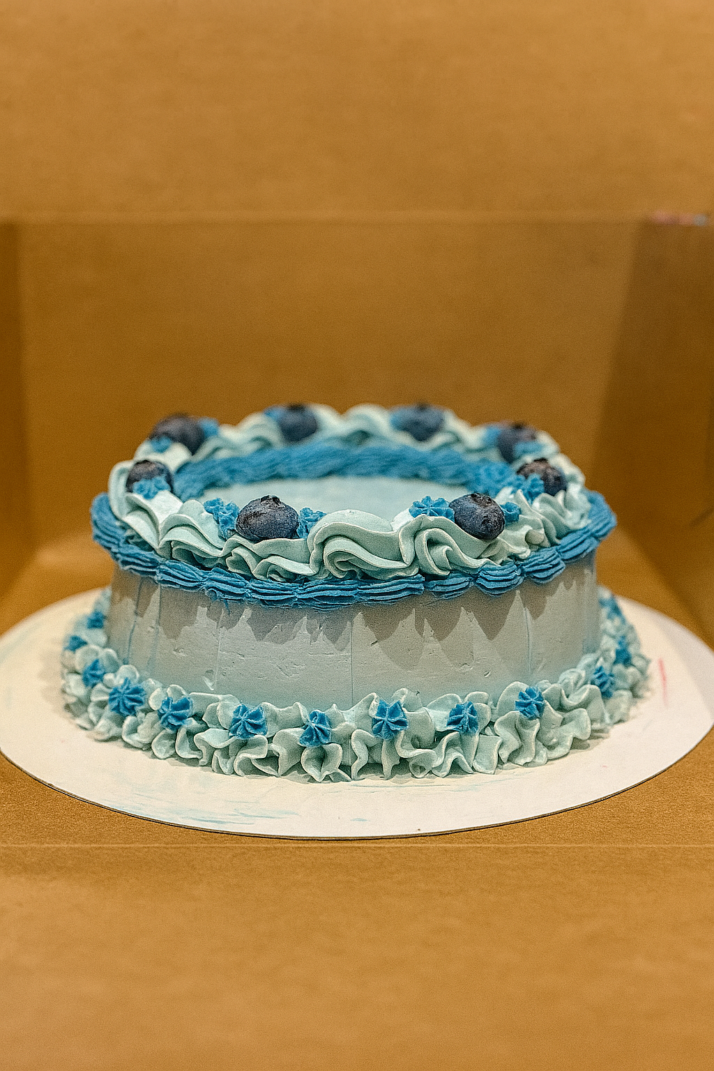 Blueberry angel food cake with blueberry buttercream